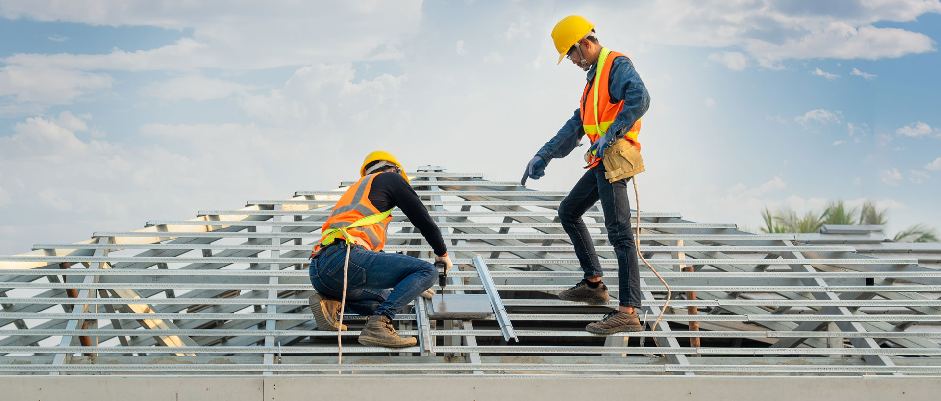 2 guys framing a roof - Jasmor Roof Installation - Professional Roofing Contractor